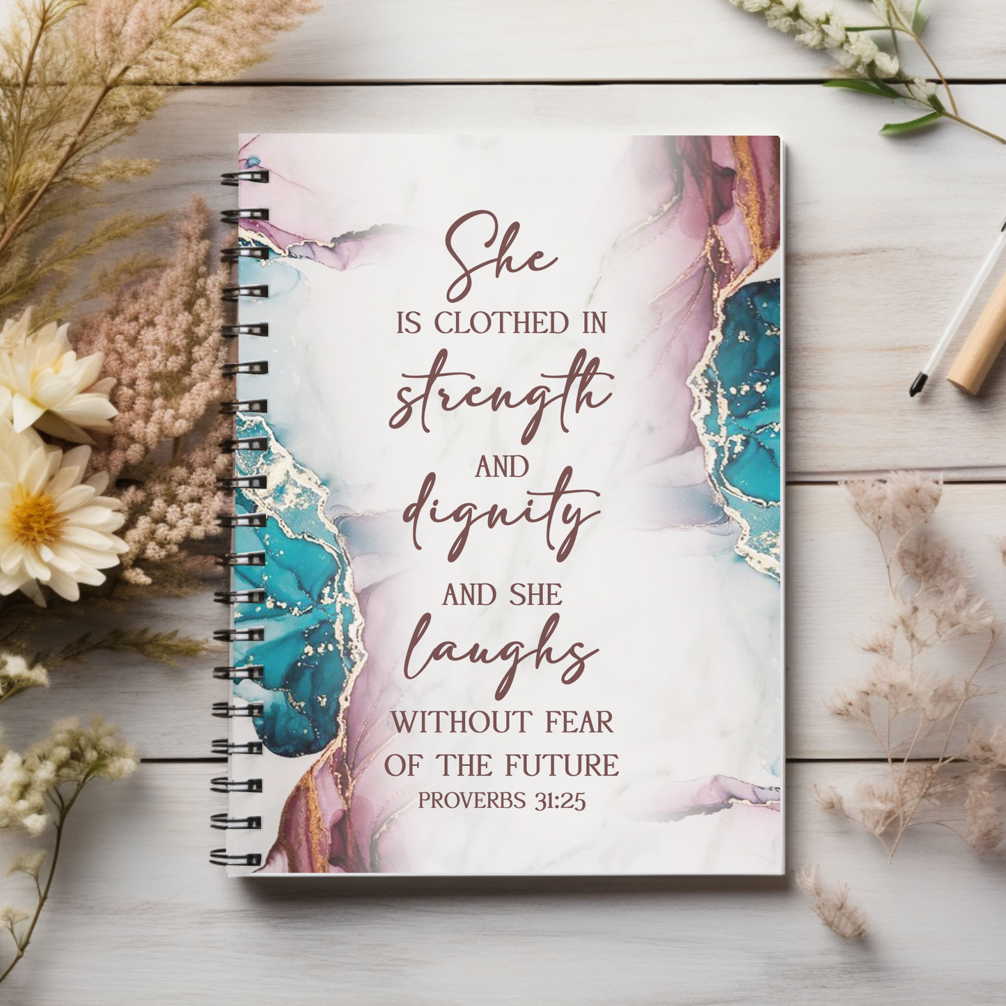She is clothed and strength and dignity Christian journal or Notebook. Notes Spiral Notebook - Ruled Line